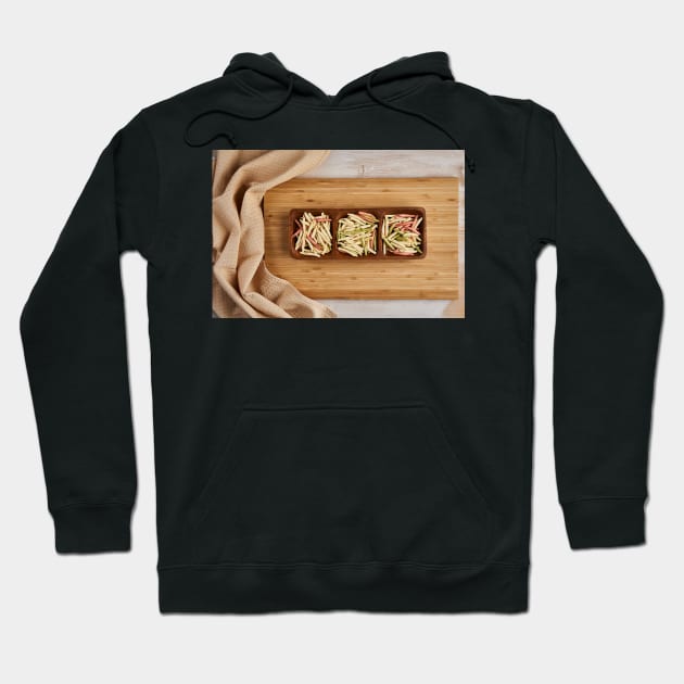 Colorful pasta on a wooden board Hoodie by naturalis